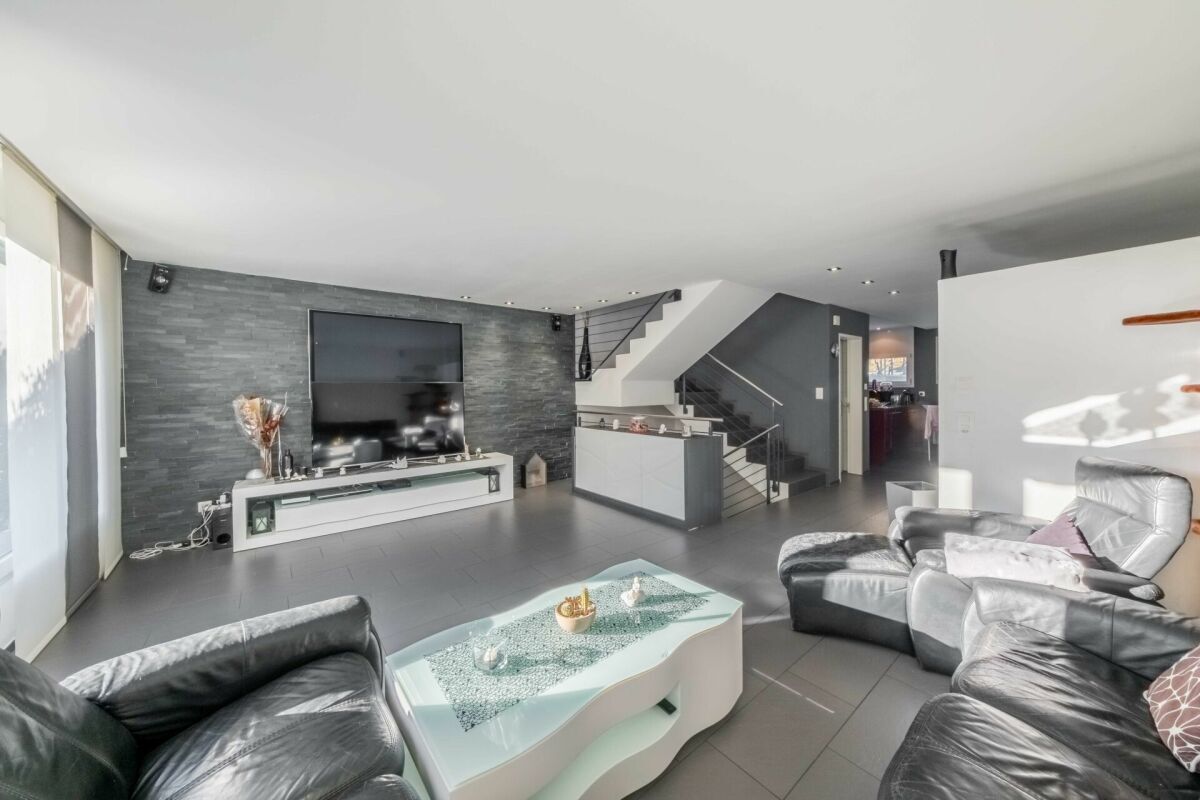 Doppeleinfamilienhaus im familiären Wohnquartier